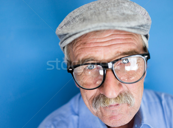 Portret glimlachend senior man snor goed kijken Stockfoto © zurijeta