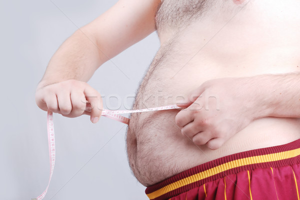 Homem gordo homem esportes braço masculino cara Foto stock © zurijeta
