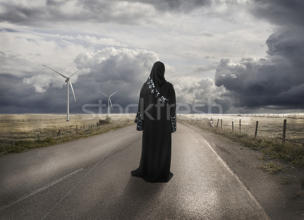 Muslim woman searching for the right way, lost in time and place - concept Stock photo © zurijeta