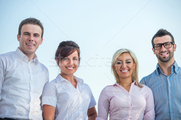 четыре улыбаясь корпоративного люди Постоянный за пределами Сток-фото © zurijeta