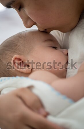 Imádnivaló baba fiú közelkép portré fehér Stock fotó © zurijeta