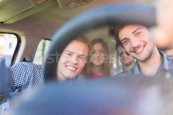 Young people having vacation enjoying fun driving car Stock photo © zurijeta