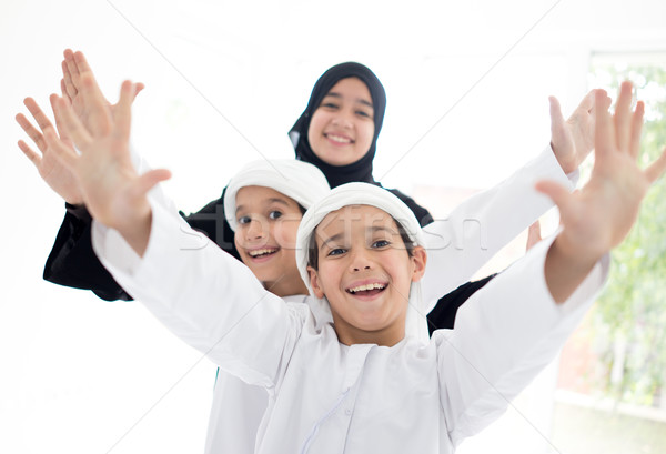 Happy Arabic family having fun at home Stock photo © zurijeta