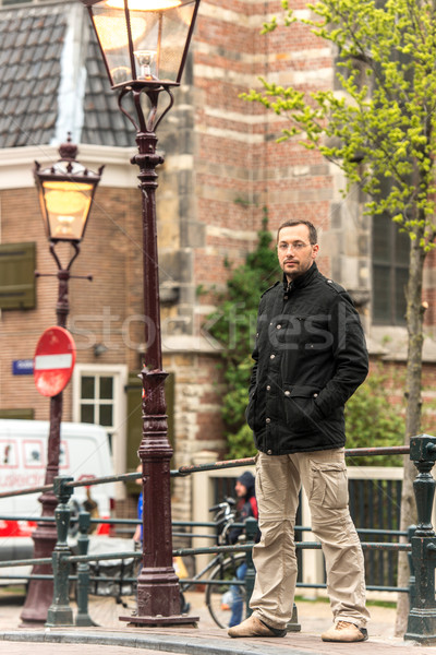 Jeune homme rue permanent vide mur mode [[stock_photo]] © zurijeta