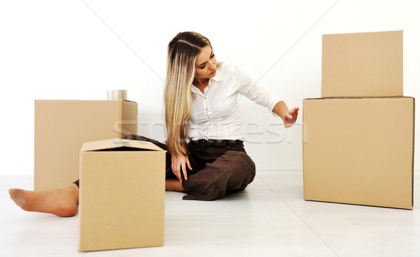 A young teen woman with her luggage and belongings moving home Stock photo © zurijeta