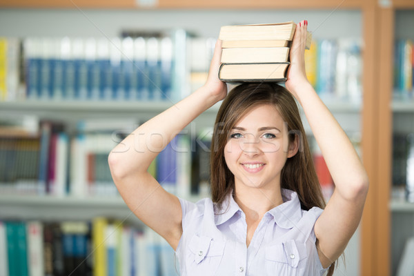 Feliz joven universidad biblioteca Foto stock © zurijeta