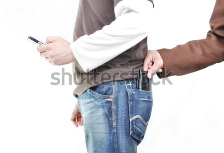 The male hand pulls out a purse from a pocket of the man. Stock photo © zurijeta