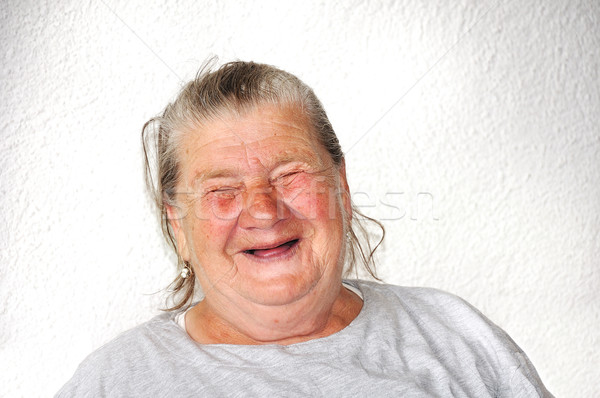 Old aged female person, very delightful and funny face Stock photo © zurijeta