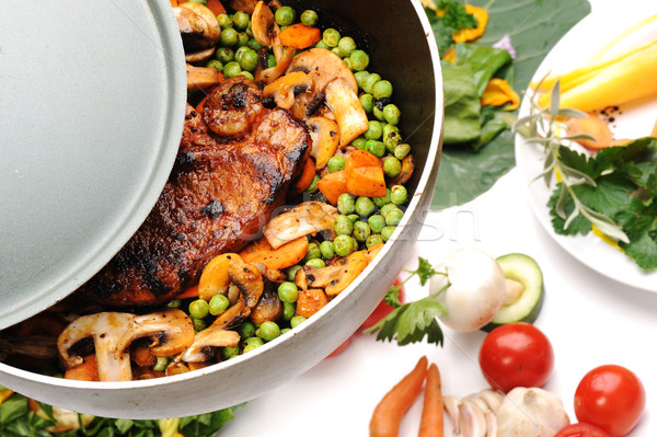 Preparing meat and vegetables for lunch, very delicious and good looking Stock photo © zurijeta