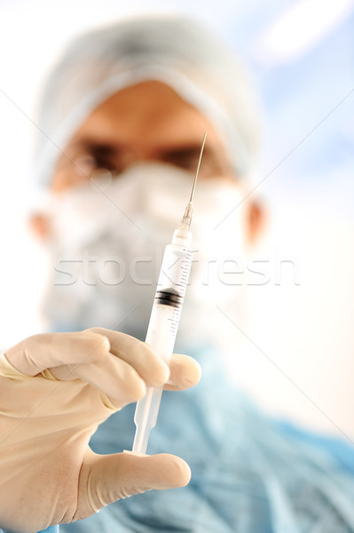 Arzt halten Injektion Impfstoff Hand Krankenhaus Stock foto © zurijeta