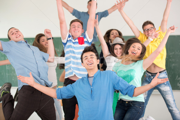 Happy students playing in classroom Stock photo © zurijeta