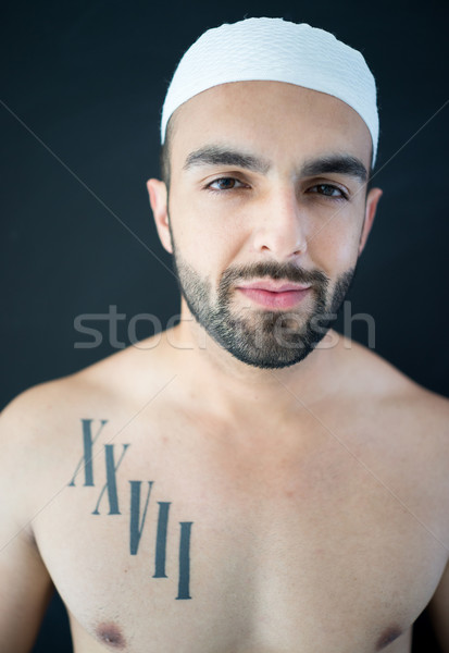 Portrait of attractive Arab man with tattoo stock photo  zurijeta  7090462  Stockfresh