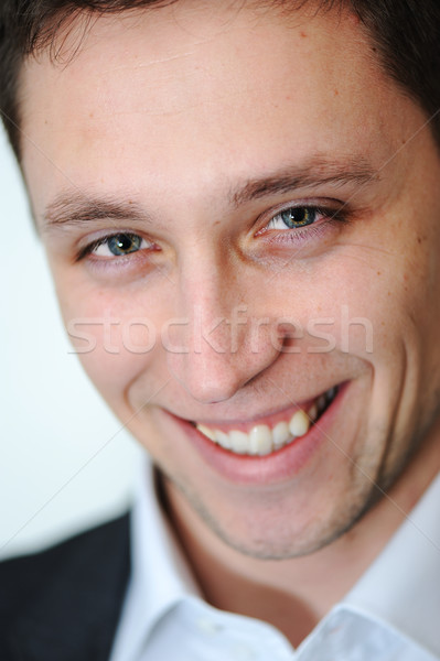Young businessman smiling Stock photo © zurijeta