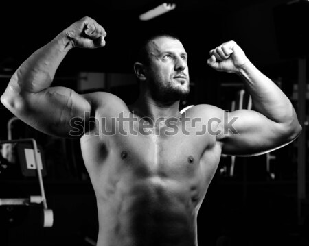 Athletic bodybuilder, execute exercise in sport gym hall Stock photo © zurijeta