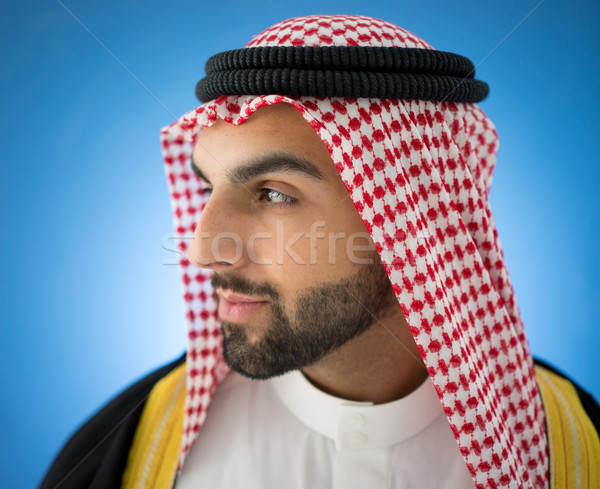 Portrait of attractive Arab man with sheikh robe Stock photo © zurijeta