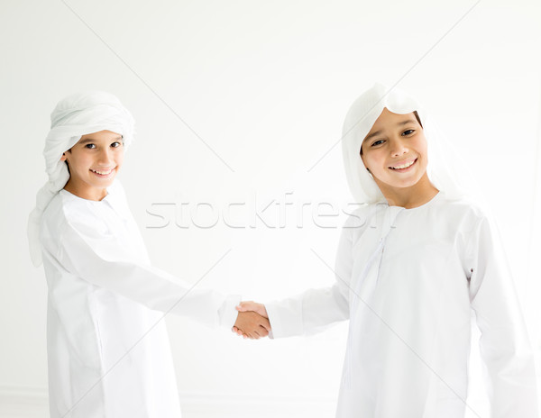 Kettő közel-keleti fiútestvérek együtt otthon boldog Stock fotó © zurijeta