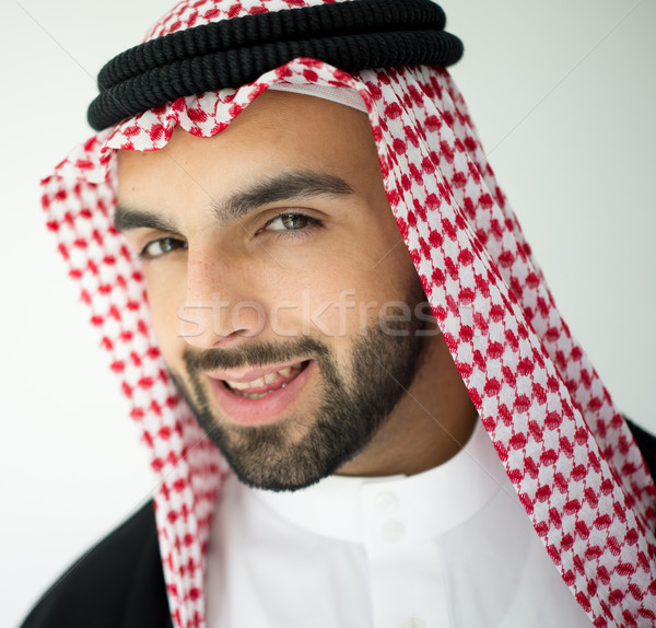 Portrait of attractive Arab man with sheikh robe Stock photo © zurijeta