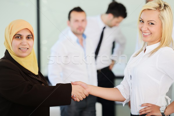 Middle eastern business people in modern office Stock photo © zurijeta