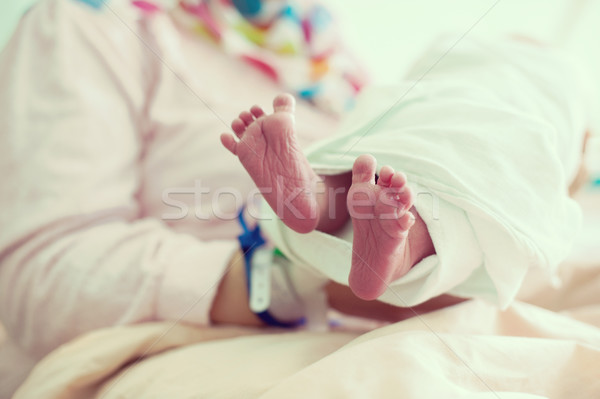 Newborn baby in hospital with id ribbon on his hand Stock photo © zurijeta