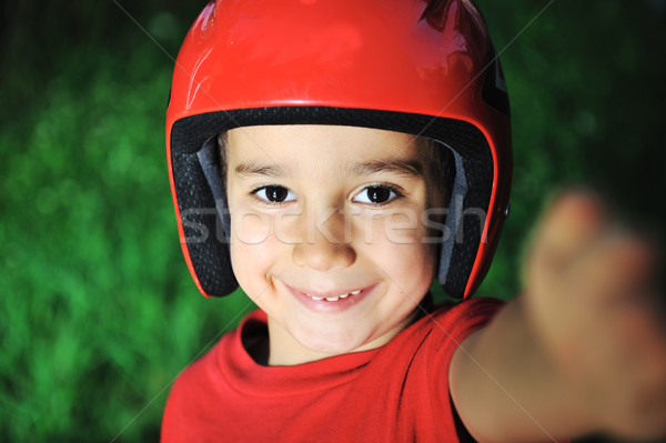 Little kid with biking safety helmet portrait Stock photo © zurijeta