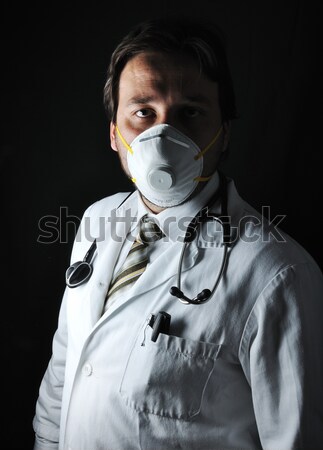 Young attractive male doctor in characteristic clothes Stock photo © zurijeta