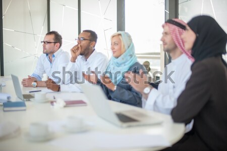 Middle eastern business people working together in modern office Stock photo © zurijeta