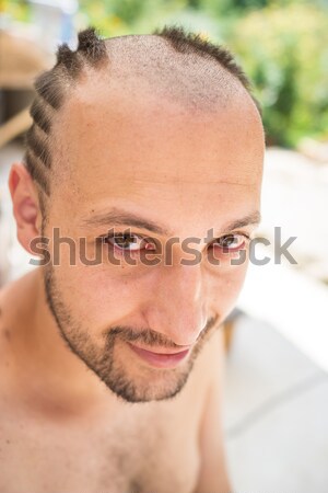 Stock photo: Bald young handsome man with blond beard
