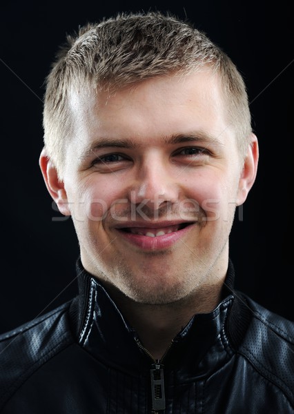 Portrait of young man smiling Stock photo © zurijeta