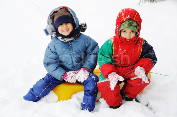  Happy children in snow  Stock photo © zurijeta