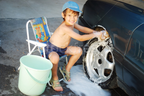 Child washing car and toy car Stock photo © zurijeta