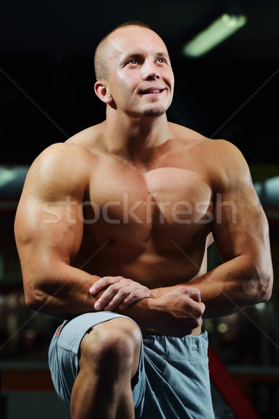 Athletic bodybuilder, execute exercise in sport gym hall Stock photo © zurijeta