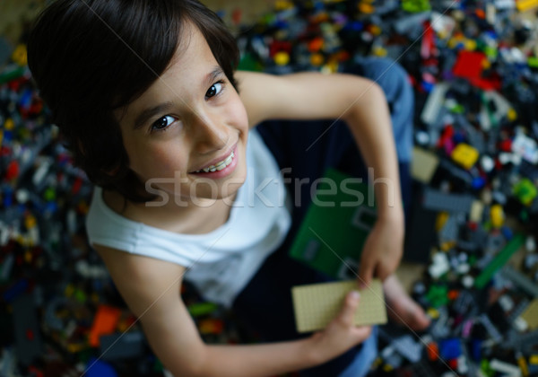 Gyermek játszik építkezés kockák gyerek keret Stock fotó © zurijeta