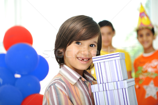 Birthday party, happy children celebrating, balloons and presents around Stock photo © zurijeta