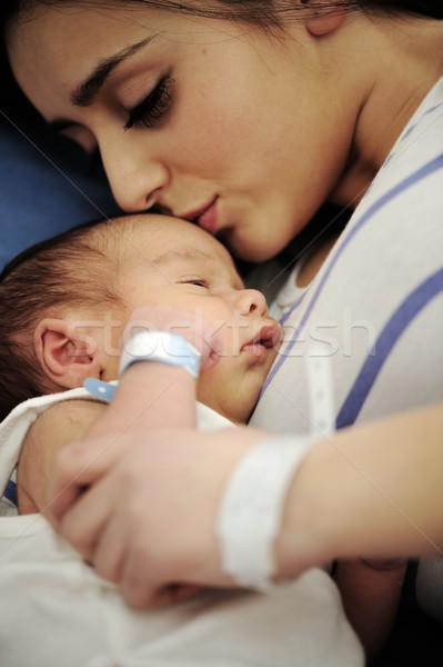 Middle eastern woman with her baby at hospital ro Stock photo © zurijeta