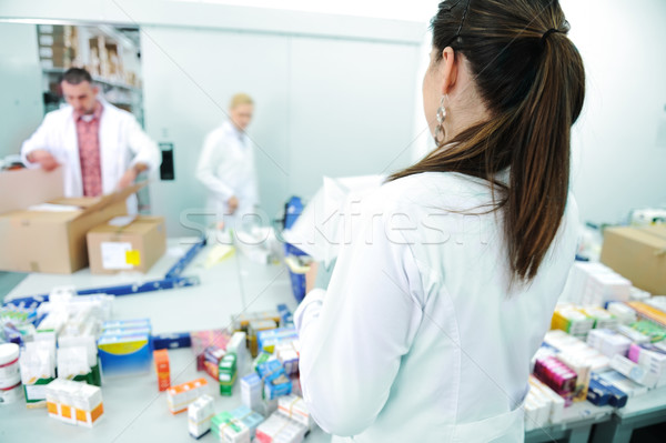 Woman, survaillance and inspecting after packaging at modern factory, warehouse Stock photo © zurijeta