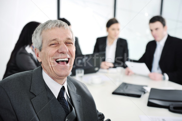 Senior imprenditore ridere ufficio riunione gruppo Foto d'archivio © zurijeta