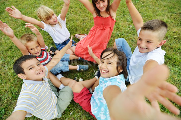 Foto stock: Grupo · feliz · crianças · verão · grama · prado