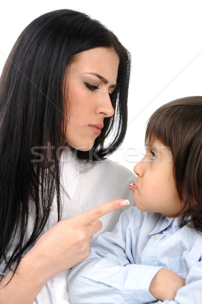 Boy confronts his mother who is threatening him Stock photo © zurijeta