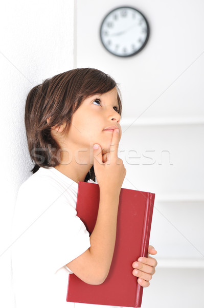 Happy cute boy with long hair indoor Stock photo © zurijeta