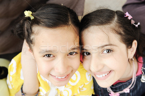 Portrait of two girls and best friends with healthy teeth Stock photo © zurijeta
