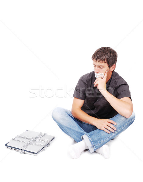 Man with isolated mouth and chained laptop Stock photo © zurijeta
