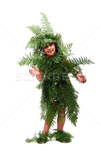 Pretty little girl dressed in green plant leafs Stock photo © zurijeta