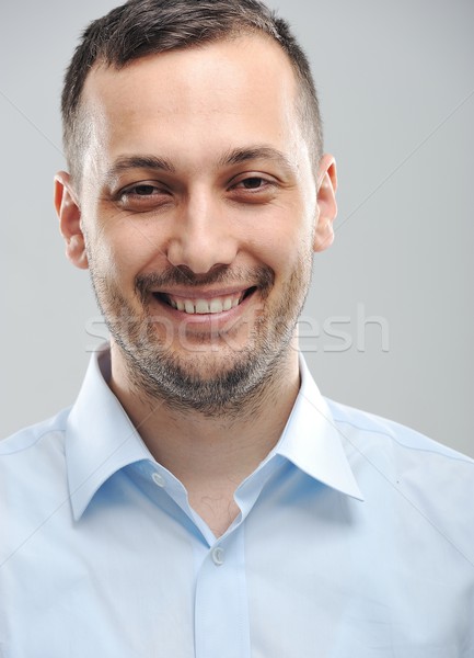 Young man smiling Stock photo © zurijeta