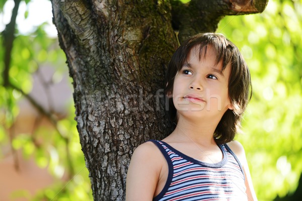 Happy kid outdoors in nature having good time Stock photo © zurijeta
