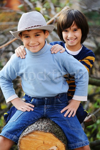 Boy portrait on tree outdoor in nature Stock photo © zurijeta