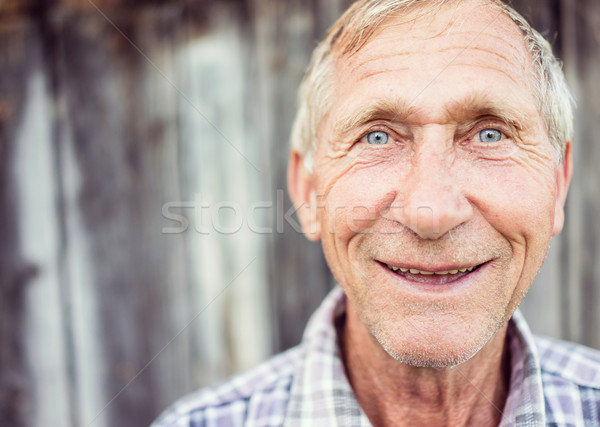 Boldog mosolyog idősebb idős férfi portré Stock fotó © zurijeta