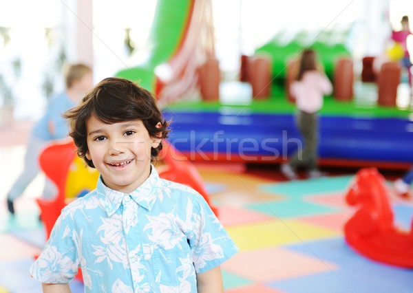 Kids playing on colorful kindergarden playground Stock photo © zurijeta