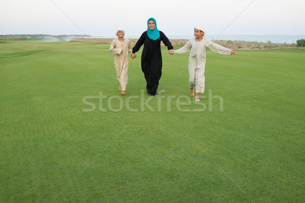 Arabe famille vert prairie nature femme [[stock_photo]] © zurijeta