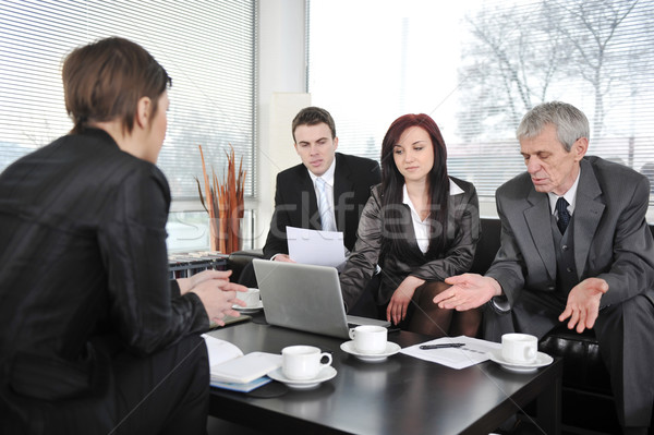 Businesswoman in an interview with three business people getting bad results Stock photo © zurijeta