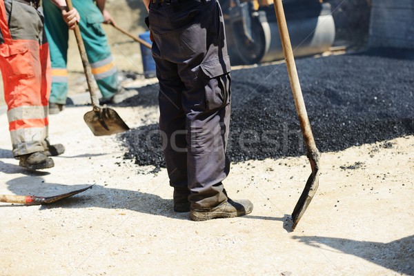 Hard work on asphalt construction Stock photo © zurijeta